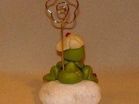 Porte-photo avec p'tite grenouille sur cailloux en porcelaine froide