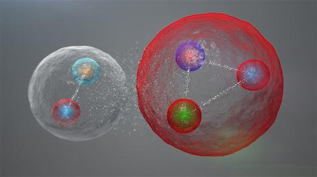 Artist's impression of how a pentaquark could comprise a meson (left) bound to a baryon. The illustration also shows the five constituent quarks as smaller spheres. (Courtesy: CERN/LHCb Collaboration)