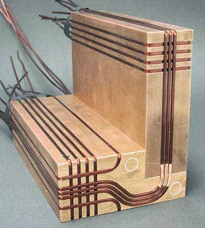 Photograph of the copper block that holds the ultracold atom reservoir