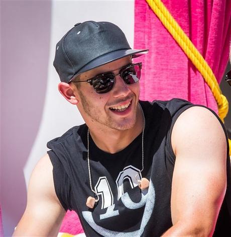 STYLE : Nick Jonas in Maison Margiela LAS VEGAS, NV - August 2: ***HOUSE COVERAGE*** Nick Jonas hosts and performs at Drai's Beach Club at The Cromwell in Las Vegas, NV on August 2, 2015. Credit: Erik Kabik Photography/ MediaPunch/IPX