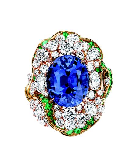 BAGUE GALON SAPHIR 750/1000e or jaune et rose, diamants,
saphir et émeraudes