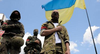 VIDÉO : En Ukraine, prise d'otages de citoyens grecques par les extrémistes du Secteur Droit