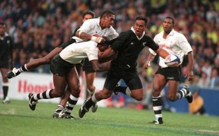 26 MAR 1995: JONAH LOMU OF NEW ZEALAND IS TACKLED BY FIJIS JOPE TUIKABE AND RATU EMORI BOLOBOLO DURING THE HONG KONG RUGBY SEVENS COMPETITION. NEW ZEALAND WENT ON TO DEFEAT FIJI IN THE FINAL. Mandatory Credit: David Rogers/ALLSPORT
