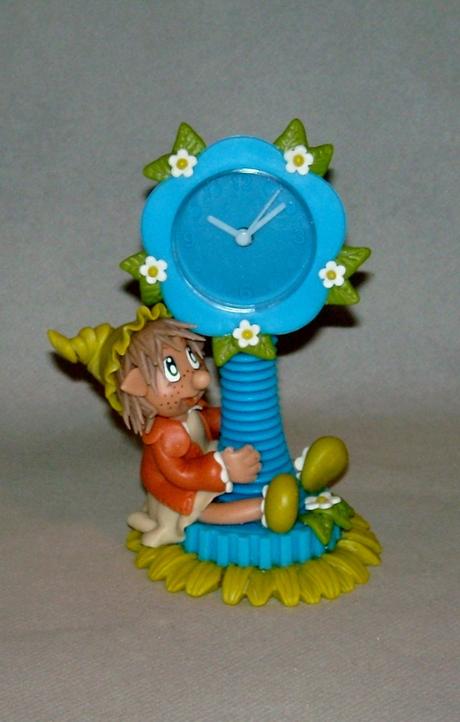 Horloge avec p'tite elfe en porcelaine froide