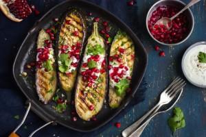 grilled eggplants with garlic yogurt sauce, walnuts and pomegran