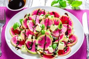 watermelon radish salad with mozzarella, onion chives and basil,