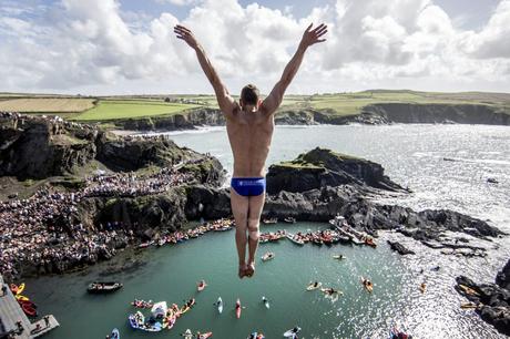 Michal Navratil of the Czech Republic dives from the 27.5 metre platform at the Blue Lagoon during the sixth stop of the Red Bull Cliff Diving World Series in Pembrokeshire, Wales on September 10, 2016.