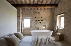 drop-dead-gorgeous-scenic-inspiring-brown-exposed-brick-wall-for-bedroom-white-wall-paint-glass-windows-white-bathtub-white-bed-sheet-brown-pillows-br