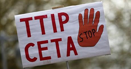 A placard against Comprehensive Economic and Trade Agreement (CETA) and Transatlantic Trade and Investment Partnership (TTIP) agreements is pictured during a demonstration ahead of U.S. President Obama's visit in Hannover