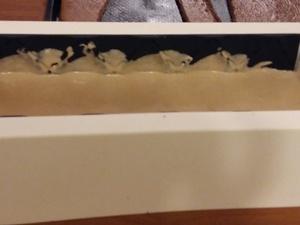 Bûche au chocolat et son Insert au crémeux de fruits de la passion Montage