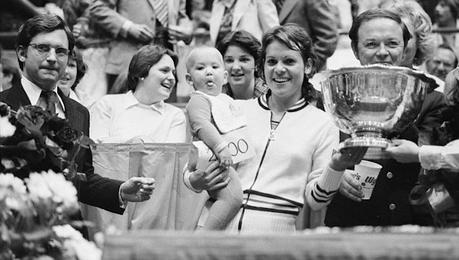 12 Mar 1978, Dallas, Texas, USA --- Dallas: Some people have a natural tendency towards showmanship. While her mother, Evonee Goolagong, was collecting $20,000 for winning the Maureen Connolly Brinker Tennis Tournament in Dallas March 12, 10-month-old Kelly, Evonne's daughter, playfully stuck her tongue out at photographers. Goolagong defeated Tracy Austin 4-6, 6-0, 6-2 in the championship match. --- Image by © Bettmann/CORBIS