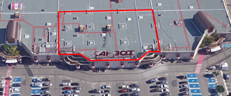 Vue de la face avant du bâtiment commercial CAP 3000 avec indiqué en rouge la zone concernée par le renforcement