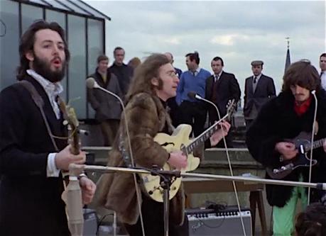 4 Beatles Sur un Toit Brûlant