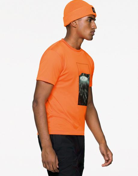 Stone Island mise sur le Orange Fluo pour sa collection SS19