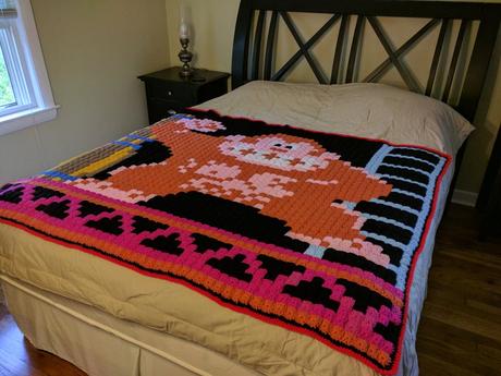 Cette grand-mère tricote des couvertures dédiées au retrogaming Cette grand-mère tricote des couvertures dédiées au retrogaming