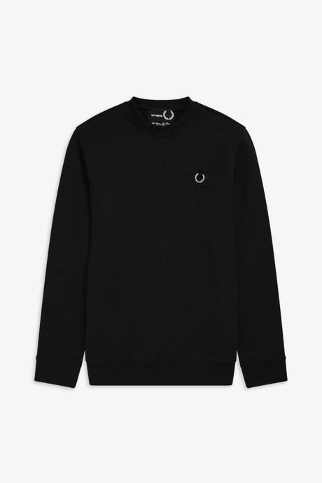 La nouvelle capsule Raf Simons x Fred Perry rend hommage à la jeunesse brittanique des années 70 La nouvelle capsule Raf Simons x Fred Perry rend hommage à la jeunesse brittanique des années 70