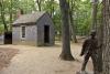 1280px-Replica_of_Thoreau's_cabin_near_Walden_Pond_and_his_statue