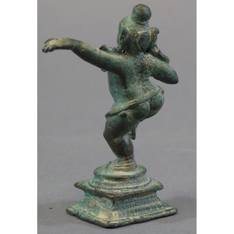A chola bronze figure of krishna | Olympia Auctions