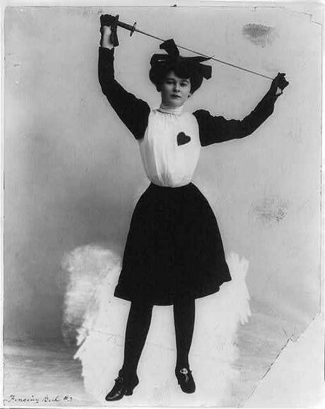 PhotoFencing-girlYoung-woman-holding-epee-above-headc1903