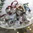   Boules de Noël en Verre Recyclé Nkuku  
 Ces jolies boules de Noël sont en verre recyclé, chaque cordon est issu de saris recyclés. 
 Nkuku est une marque engagée, spécialisée dans des pièces faites à la main dans le respect de l'environnement et de l'homme. 
  Prix indicatif :  5€ la boule sur le site  www.mon-bodo.fr  