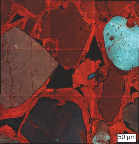 L'imagerie par cathodoluminescence d'une pierre sarsen de Stonehenge révèle les contours de grains de sable (bleu pâle, noir) et de multiples couches de ciment de quartz (rouge).