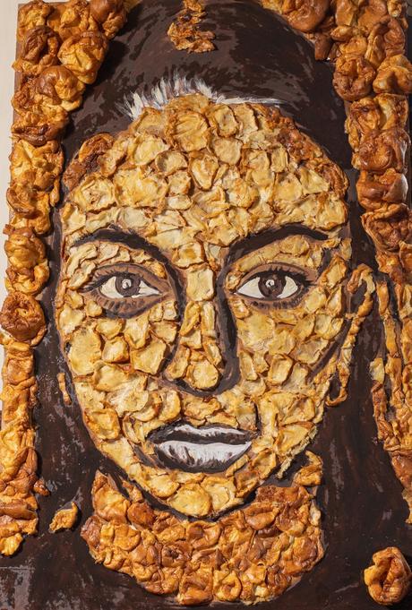 Portrait de propriétaire composé de dizaines de puddings du Yorkshire a l’air presque trop beau pour être mangé Portrait de propriétaire composé de dizaines de puddings du Yorkshire a l’air presque trop beau pour être mangé