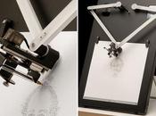 bras robotique automatisé fait photomaton conventionnel dessine votre portrait