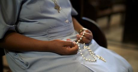 Chaque matin, je m'arrêtais à l'église pour prier la neuvaine du Rosaire