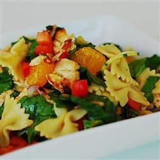 An easy pasta chicken salad showcases Asian flavors with mandarin oranges, fresh ginger, rice vinegar, and sesame oil.