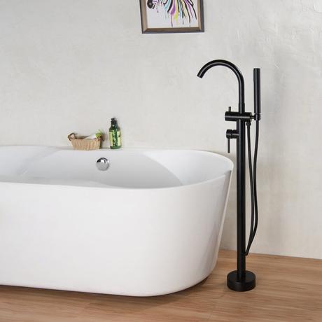 baignoire ovale blanche robinet noir contemporain moderne