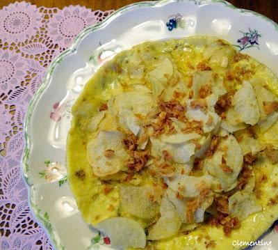 Omelette aux chips de pommes de terre et oignons séchés par Eric Frechon