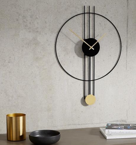 horloge pendule ronde métal noir laiton design moderne