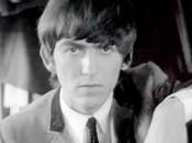 George Harrison parle l'”étiquette” presse donnée lorsque Beatles sont arrivés Amérique.