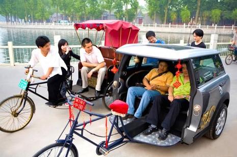Pousse-pousse dans les rues de Pékin