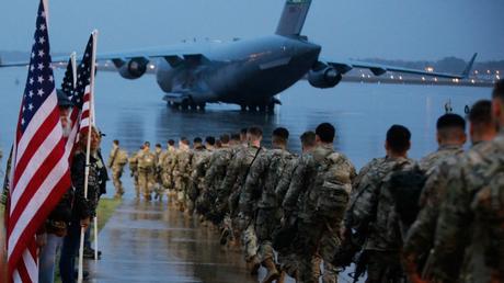 https://media.thecradle.co/wp-content/uploads/2022/11/American_Paratroopers_deploy_to_Middle_East_January_2020-scaled-e1624475406872.jpg