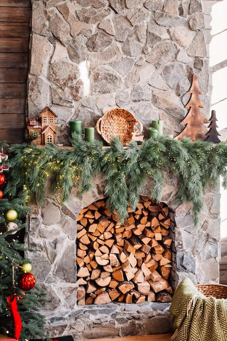 Fireplace,Decorated,With,Christmas,Lights,In,A,Cozy,Wooden,Room.