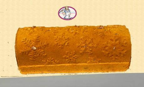 La bûche de Noël 2022 mandarine marron La bûche de Noël 2022 mandarine marron