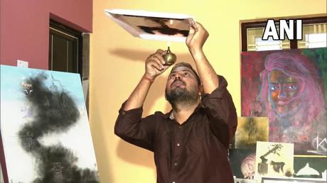 Un artiste fait un portrait fumé de Lionel Messi avec la Coupe du monde – ThePrint – ANIFeed