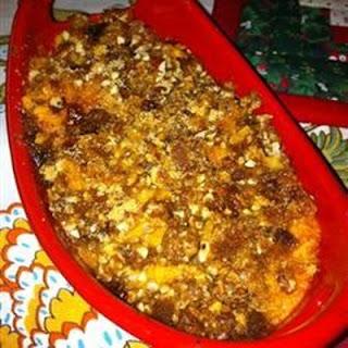 Sweet potatoes are combined with a tropical blend of coconut and pineapple in a sweet-enough-for-dessert side dish. An easy pecan crumble topping makes this casserole extra special.