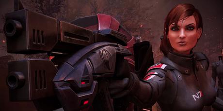 Le commandant Shepard pointe son pistolet blaster dans Mass Effect Legendary Edition.