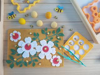 Découverte du thème des abeilles : table de jeu, activités et lectures.