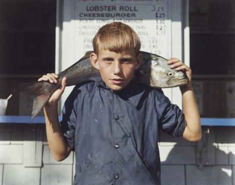 Joel Meyerowitz, Boy with Bluefish, 1980.